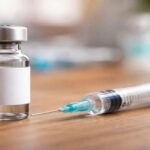 Vaccine vial and syringe