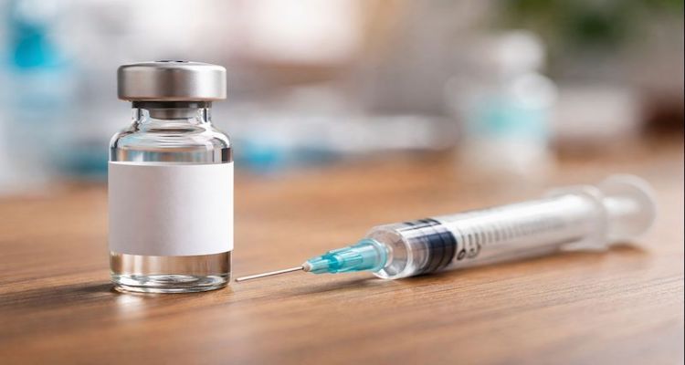 Vaccine vial and syringe