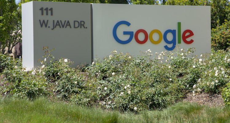 Sergey Brin and Larry Page at a tech event