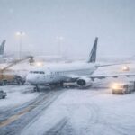 Snowstorm at the airport tarmac