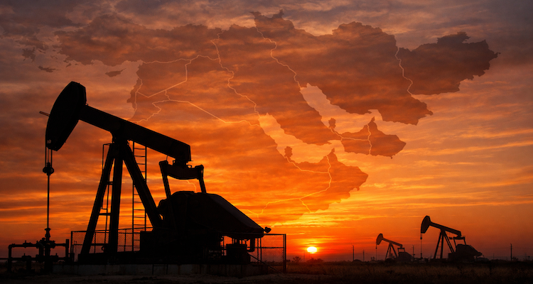 Oil pumpjack at sunset with map