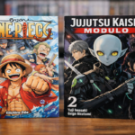 Manga volumes displayed on wooden surface