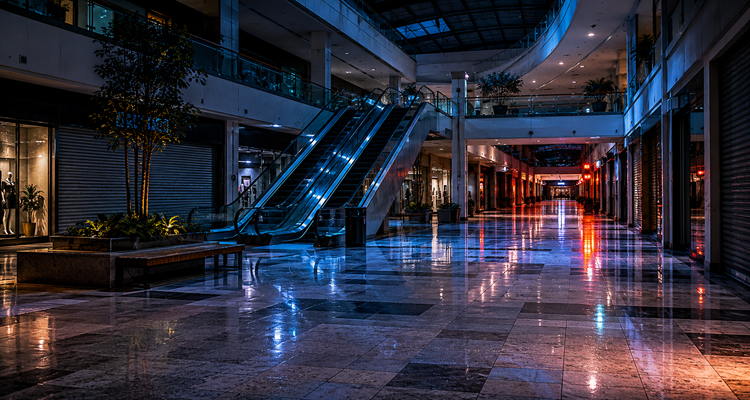 Empty mall atrium at night