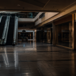Empty mall corridor with escalators
