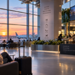 Travelers experiencing a modern airport terminal with dining, lounge spaces and destination-inspired design